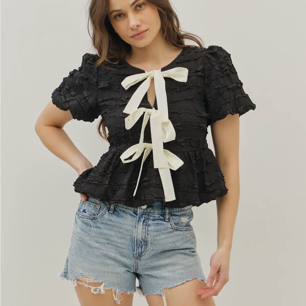 Elegant Black Ruffled Top with White Bow